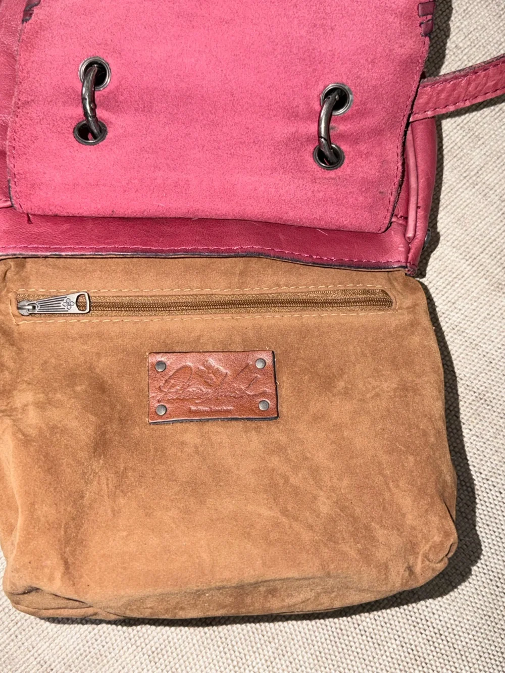 Patricia Nash Karis Leather Whipstitch Saddle Bag in a rich red/berry